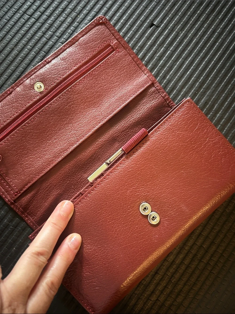 Wilson’s leather, maroon Leather trifold, wallet with Gold Accent